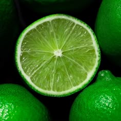 the lime is cut in half and ready to be used as a garnish