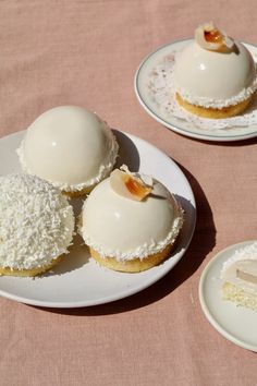 three desserts on plates with one slice missing