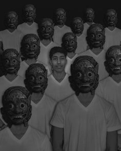a group of people with masks on their faces