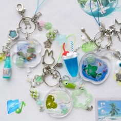 several key chains with various items attached to them