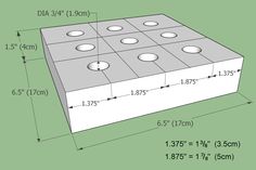 a drawing of a square box with four holes in it and measurements for the width