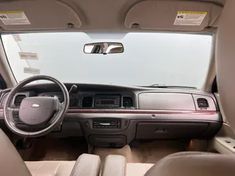 the interior of a vehicle with leather seats