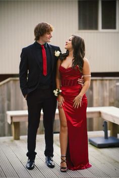Matching Prom Dates, Red Prom Outfits For Couples, Red Prom Outfits, Red Prom Dress And Suit, Red Prom Dress With Date, Red Prom Couple Outfit, Matching Prom Outfits For Couples, Black Suit Red Tie Prom, Prom Red Couple