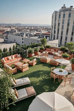 an outdoor seating area on top of a building