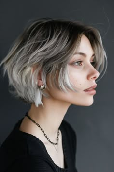 Short High Contrast Hair, Black Hair With White Highlights Short, Platinum And Black Hair Short, Short White And Black Hair, Black And Silver Short Hair, Silver Money Piece Short Hair, Platinum Short Hair, Black Hair With Platinum Highlights Short Hair, Ghost Roots Short Hair
