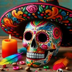 a colorful skull wearing a sombrero and a candle