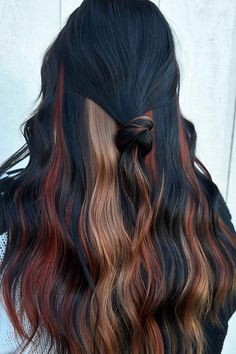 There is a cool new hair trend and it's inspired by calico cats of all things! It features hairstyles with the most gorgeous copper, blonde & dark brown highlights. Here is calico hair color inspiration to make the trend your own! #calicohair Dark Hair With Copper Underneath, Black Hair With Colored Underneath, Black Hair With Calico Peekaboo, Black And Golden Hair, Calico Hair With Black, Fun Black Hair Color Ideas, Different Color Highlights On Black Hair, Black Brown And Red Hair, Dark Hair With Halo Highlights