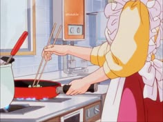a woman cooking food in a kitchen with chopsticks sticking out of the pot