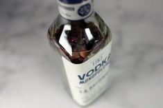 a bottle of vodka sitting on top of a table