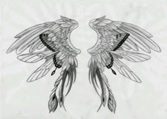 two wings with black and white designs on them