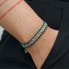 Vibrant Woven Friendship Bracelet With Intricate Patterns. Features Teal, Orange, And White Colors. Beautiful Emerald Green Finely Woven Bracelet With A Silver Sparkle Thread Woven Through. Details: Bracelet Length: 9 In. Bracelet Width: .4 In. Woven In Silk Cotton, And Wool Threads In Emerald Green, Marigold, White, Yellow, And Silver Tinsel. Woven Slim Bracelet, That Lays Flat On Your Wrist And Is Secured By The Tie-On Ties. 100% Handmade Tie Bracelet Patterns, Men’s Friendship Bracelet, Green Friendship Bracelet, Floss Bracelets, Lavender Beaded Bracelet, Butterfly Charm Bracelet, Pink Beaded Bracelets, Cotton Bracelet, Bronze Bracelets