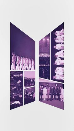 a group of people standing next to each other in front of a white wall with multiple pictures on it