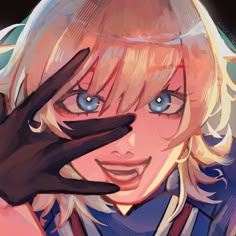 a woman with blonde hair and blue eyes holding her hand up to her face