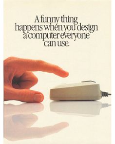 an advertisement for a computer mouse with a hand pointing at it