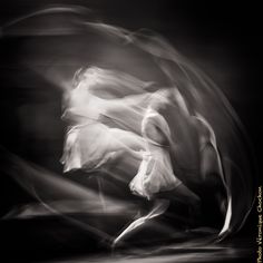 black and white photograph of woman in motion