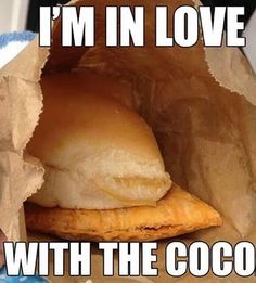 a sandwich in a paper bag with the words i'm in love with the coco