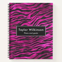 a pink and black zebra print notebook with the name taylor wilkinson on it