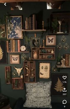 there are many framed pictures on the wall