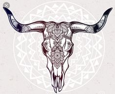 the bull skull is decorated with an ornament