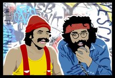 two men in front of a wall with graffiti