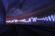 a train track with many lights on it