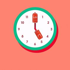 a clock with an image of a boxing glove hanging from it's side on a pink background