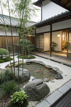 a japanese style garden with rocks and plants