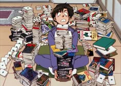 a person sitting on the floor surrounded by stacks of books and piles of other books