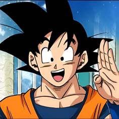 a young gohan with his hands in the air