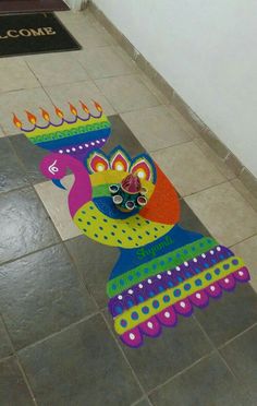 a decorated floor with an image of a peacock on it
