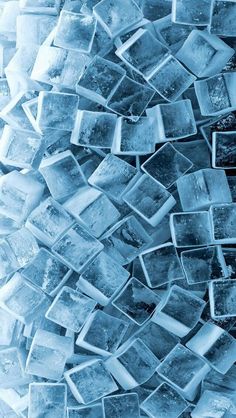 ice cubes are stacked up in the snow to be used as wall art or decoration