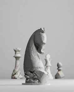 a white chess set sitting on top of a table