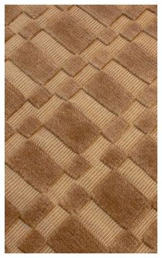 a brown rug with squares on it