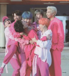 a group of young men standing next to each other