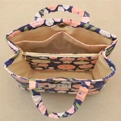 an open purse sitting on top of a table