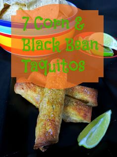 some food is sitting on a plate with limes and tortillas in the background