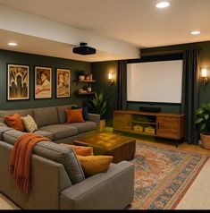 a living room filled with furniture and a flat screen tv mounted to the side of a wall