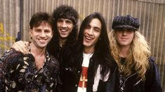 the group of young men are posing together