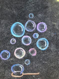 an image of soap bubbles floating in the air