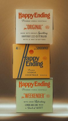 three boxes stacked on top of each other with the words happy ending written on them