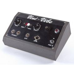 an electronic device with buttons and knobs