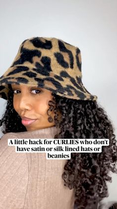 You will need   • A satin or silk scarf   • Your favourite hat, beanie   Curls can be very sensitive especially in the colder months . It’s so important to protect them from harsh conditions and to prevent damage, frizzing , knotting and split ends . In winter we can do this by wearing protective styles but also covering our curls in headwraps , silk or satin lined hats or beanies or just your bonnet   It can get quite expensive to buy all these accessories but here is a little hack for when you have your favourite hat or beanie that isn’t satin or silk lined . Yes you can still wear them ! . This video shows you how   How  • Taking your silk or satin scarf , fold it in a triangle   • Tie it around the crown of your head , just tight enough to secure it   • And then place you hat or bea Hats For Curly Hair, Hat For Curly Hair, Best Hats For Curly Hair, How To Wear A Beanie With Natural Hair, Hats For Curly Hair Winter, How To Wear A Bucket Hat With Curly Hair, Curly Hair With Winter Hat Style, Silk Cap For Curly Hair, Satin Head Scarf Curly Hair