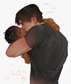 a man holding a baby in his arms