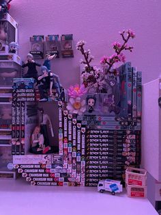 there are many pictures and toys on the wall