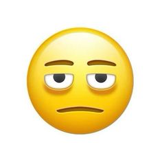 an emoticive yellow smiley face with two eyes and one eye opened to the side