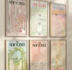 four new york posters are hanging on the wall