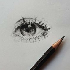 a pencil drawing of an eye