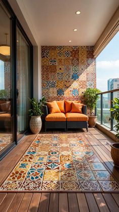 an orange couch sitting on top of a wooden floor next to a plant filled window