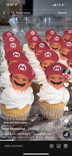 some cupcakes with faces on them sitting on a table