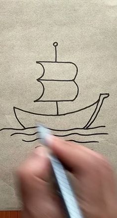 someone is drawing a boat on the ground